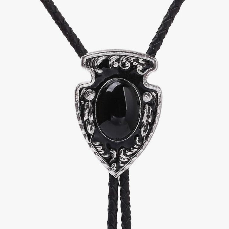 Black and silver bolo tie on a white background