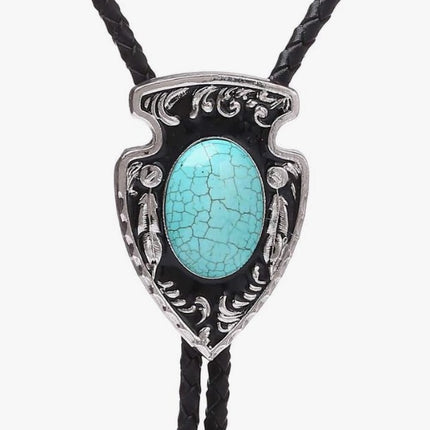 Turquoise stone on a Western Cowboy Bolo Tie Necklace with silver detailing on a white background