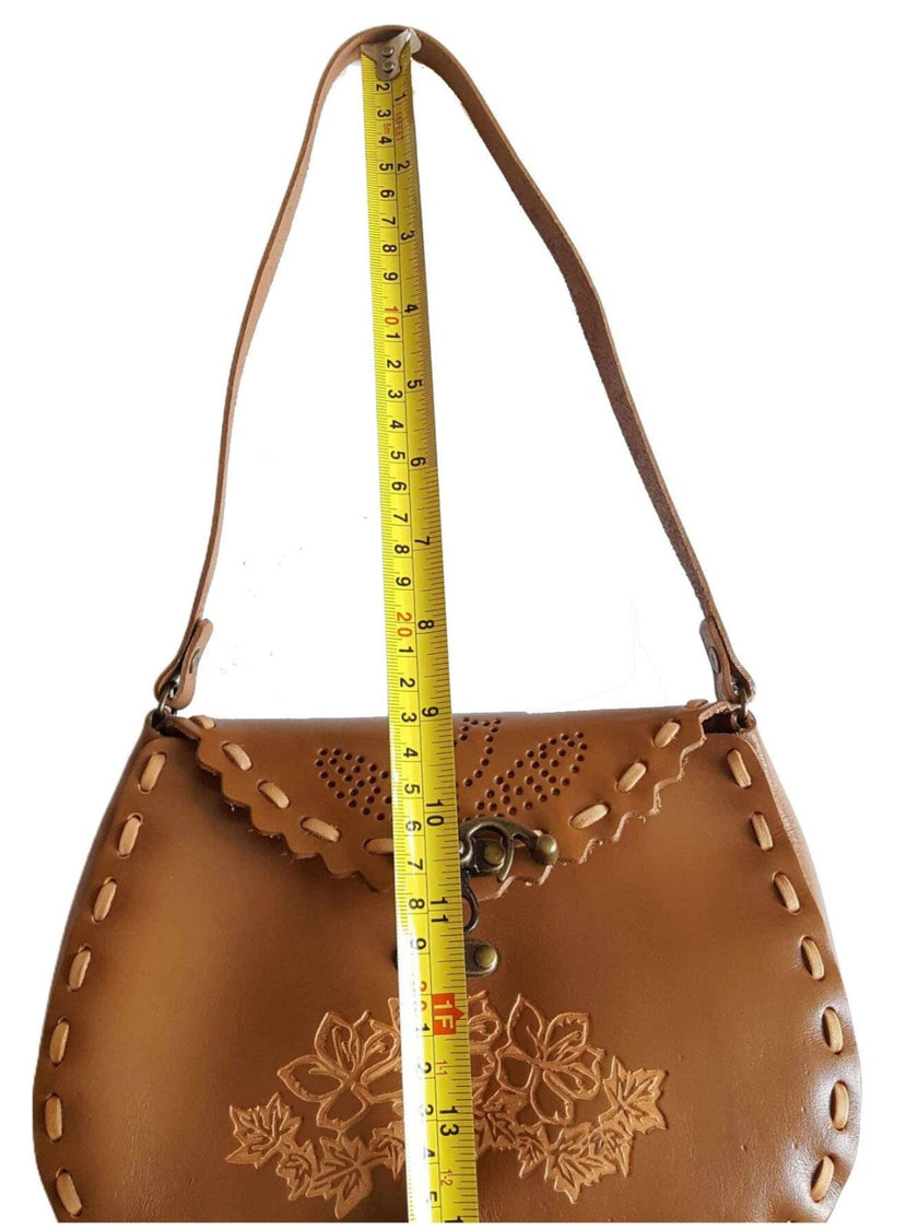 Axesoria West - Genuine Leather Shoulder Handbag with Floral Design shown with measuring tape