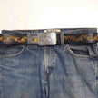 Axesoria_West_-_Silver_Rodeo_Buckle_with_Vintage_floral_tooled_belt_tan view on jeans