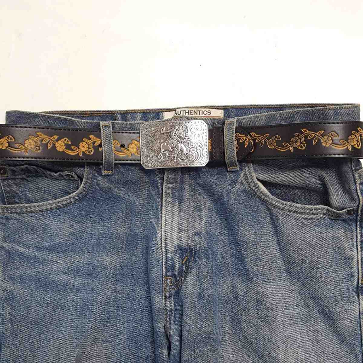 Axesoria_West_-_Silver_Rodeo_Buckle_with_Vintage_floral_tooled_belt_tan view on jeans