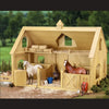 BREYER Deluxe Wood Barn with Cupola open view of two horses in their stalls.