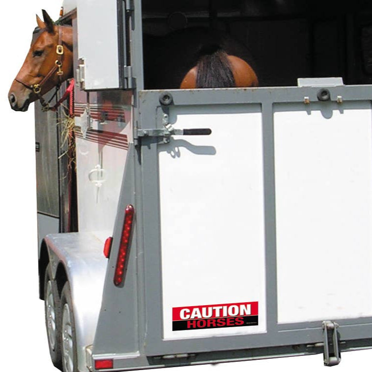 Bumper Sticker: Caution Horses! on a horse trailer
