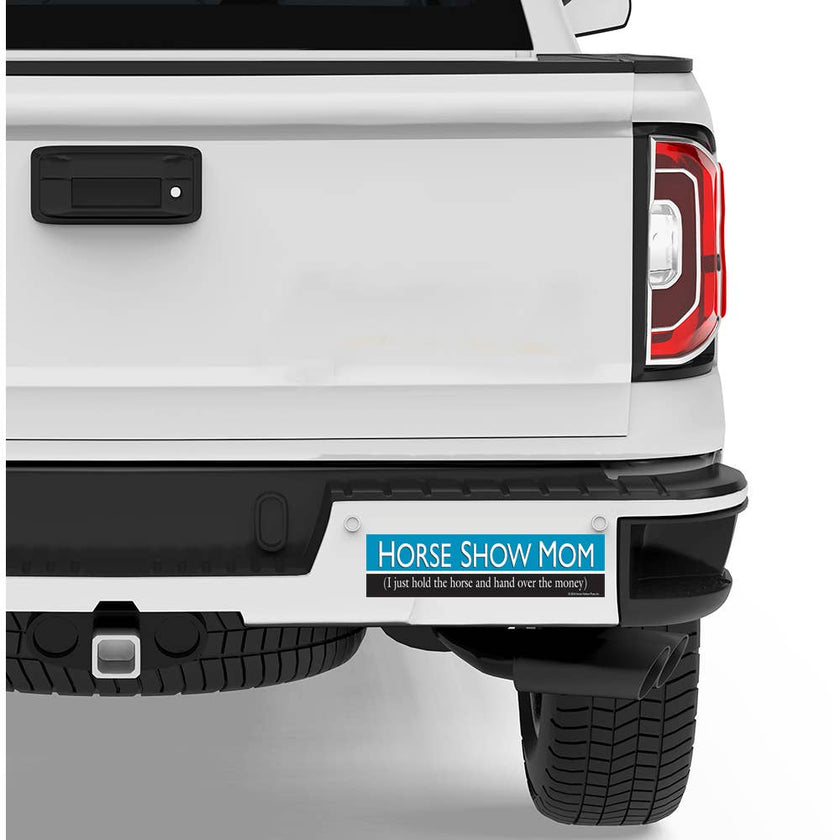 White truck with a 'Horse Show Mom' bumper sticker on the rear