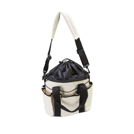 Canvas Drawstring Grooming Tote closed showing shoulder strap and short handle