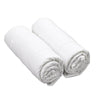 Two rolled-up white EQUIESSENT Pillow Leg Wraps