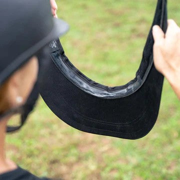 EquiVisor® Cotton Helmet Sun Visor shown off helmet in hand