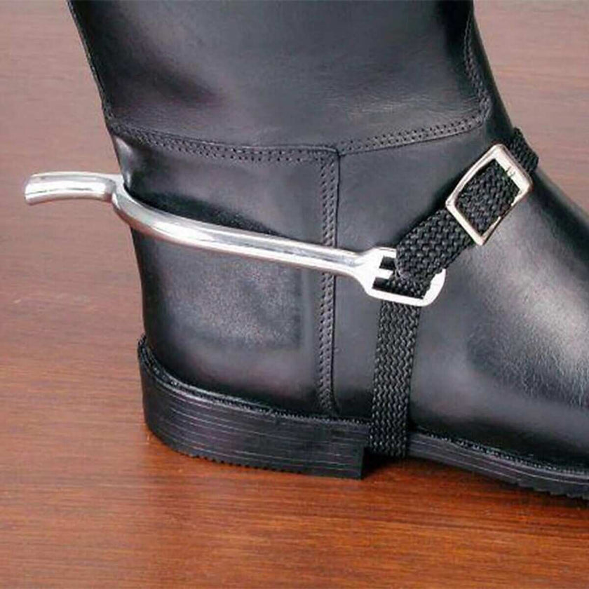Black boot showing a spur with black nylon strap