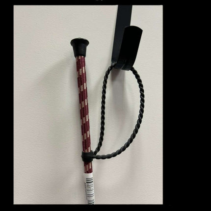 Gatsby English Riding Crop showing a close up of the  handle in burgundy with tan accents.