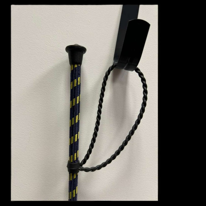 Gatsby English Riding Crop showing a close up of the handle in navy with yellow accents