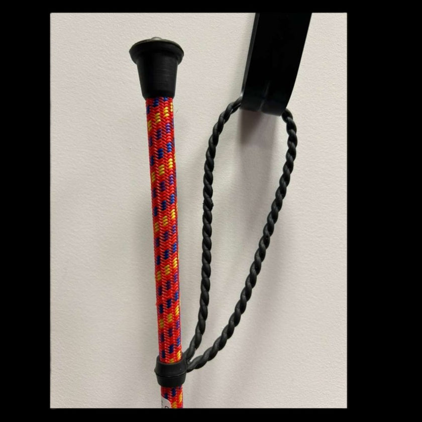 Gatsby English Riding Crop showing a close up of the handle in orange with purple, royal blue and yellow accents.