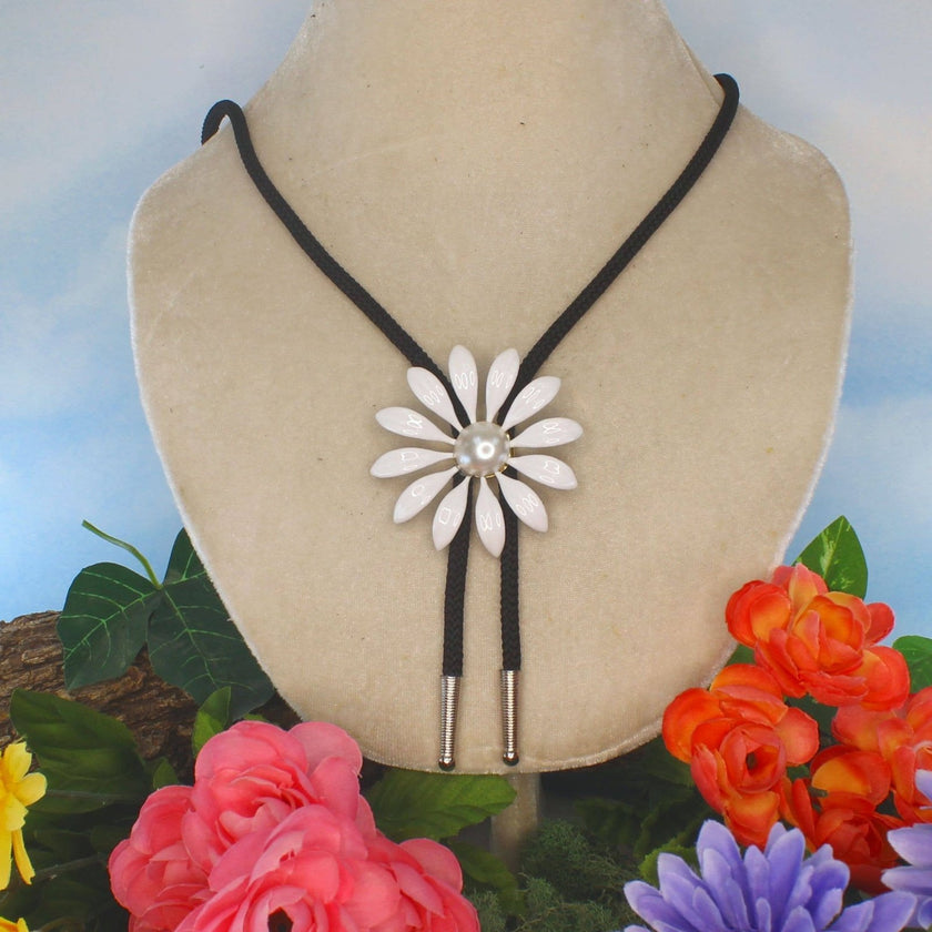 HHH Designs - 59mm White Enamel Daisy Bolo Tie WIth Pearl Stone on display