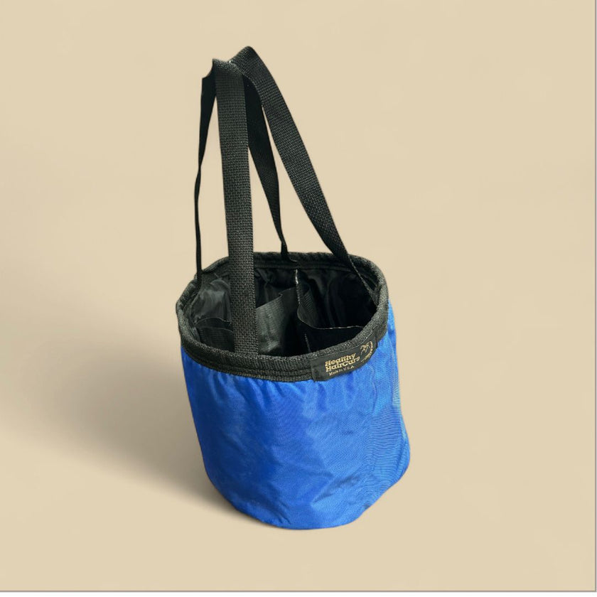 Healthy HairCare Grooming Bag Blue and black with two black handles.