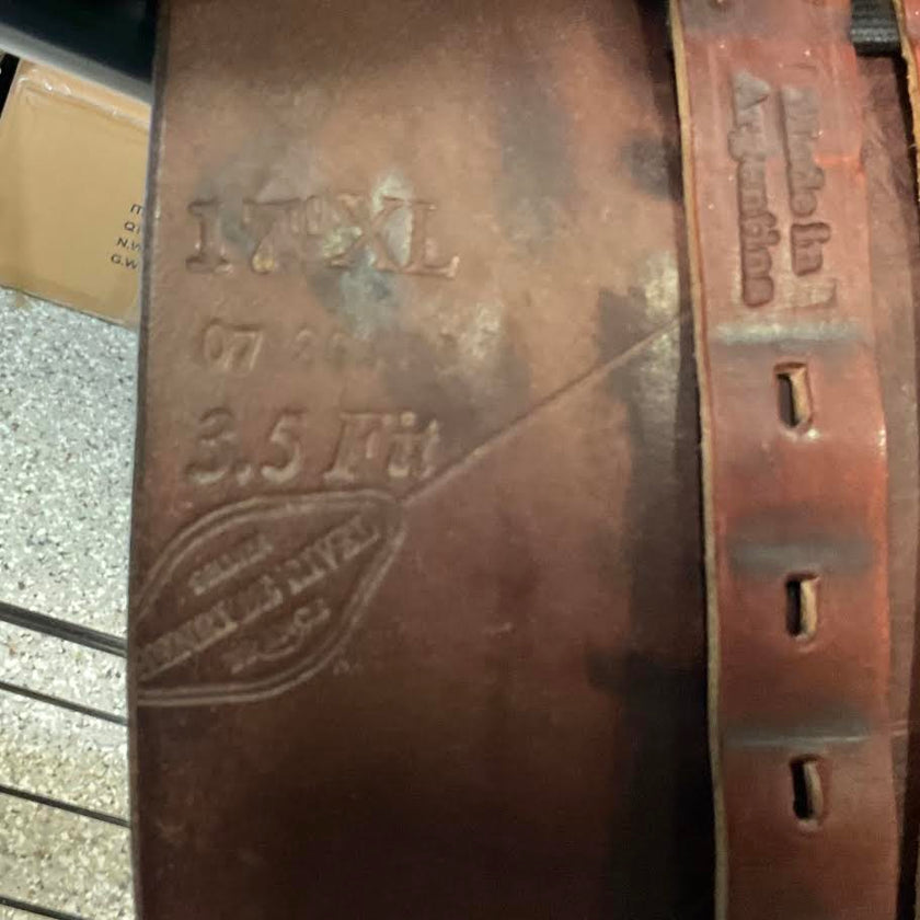 Close-up of inside flap on Henri De Rivel Pro AO Saddle - engraved text and branding.