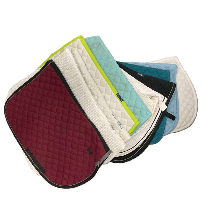 KHS-E Assorted English Saddle Pads showing some of the options in color and style of the assorted pads available.
