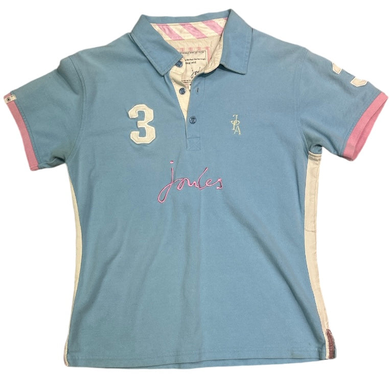 A blue and white Joules women's polo shirt with pink collar and details.