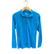 KHS-E XS Sun Shirt, Blue long-sleeve shirt on a hanger against a white background
