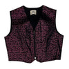 black vest with pink swirls