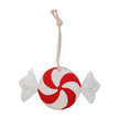 Red and white candy-themed horse toy with a rope to be hung in the stall or paddock.
