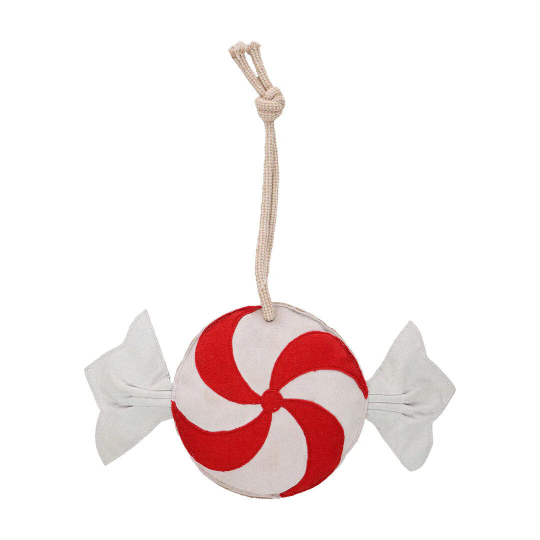 Red and white candy-themed horse toy with a rope to be hung in the stall or paddock.