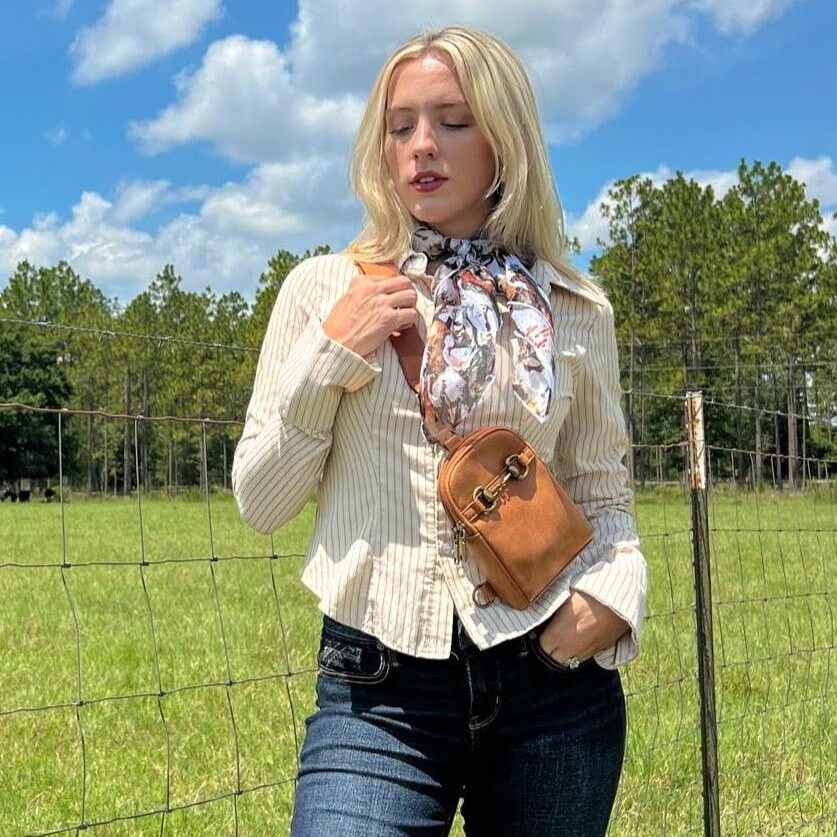 crossbody sling bag worn by a model