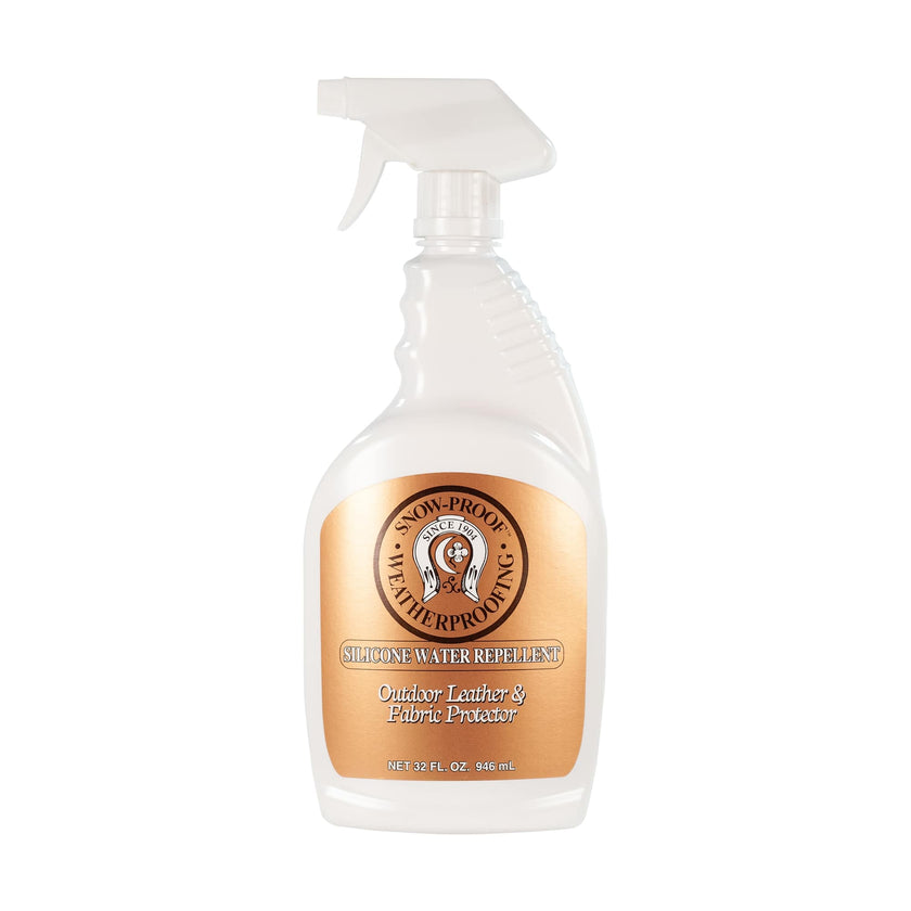 A white spray bottle with a label showing the Fiebing's brand logo, brown and gold color scheme, and text indicating the product is a silicone water and stain repellent.