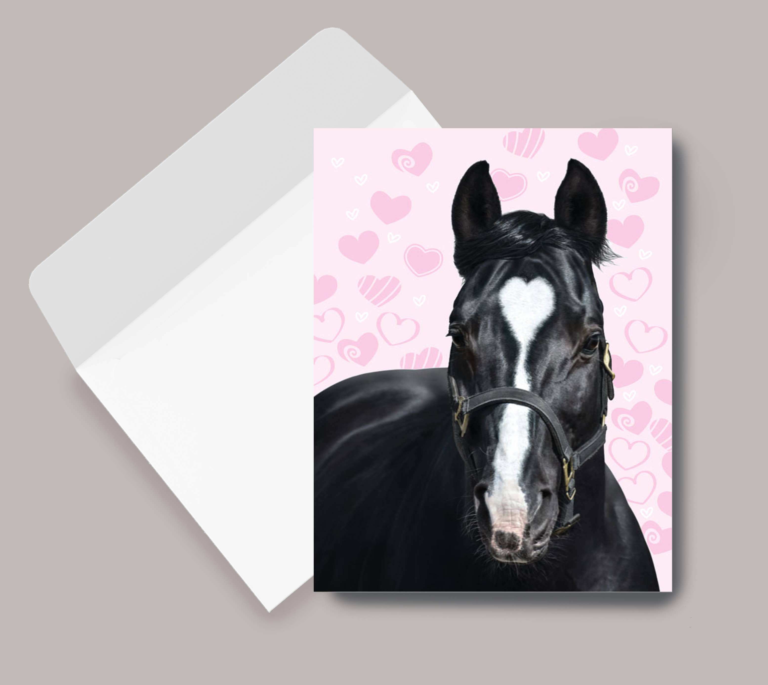 Thank You Card - Horse with Heart with a black horse illustration on a pink background with hearts, next to an envelope.