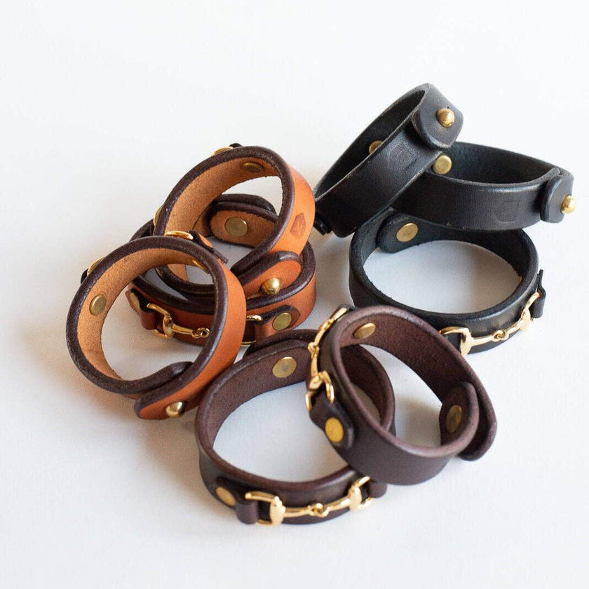 Leather Bit Bracelets showing three colors: light brown, dark brown and black
