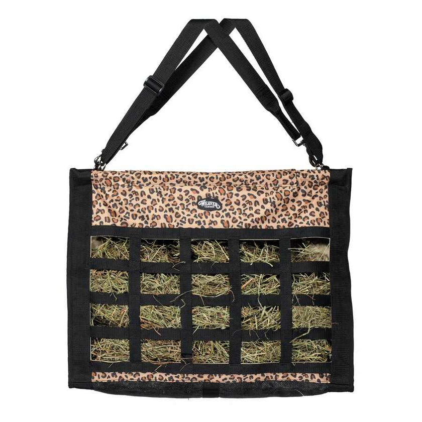 Weaver Slow Feed Hay Bag with leopard print top section and black sides filled with hay, on a white background.