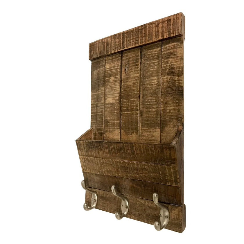 Wilco Home - Big Bend Wall Pocket W/hooks hanging on a white wall.