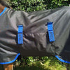 Horseware® Amigo Ripstop 900D Foal Turnout 200g in Black Classic Blue accents showing belly wrap closure.