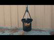 Cashel Collapsible Water Pail / Bucket shown collapsed, then opened and filled with  water by a person who puts it on the ground in front of a horse near a horse trailer.
